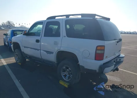 2003 Chevrolet Tahoe Z71 из США, поврежденный, VIN 1GNEK13T63R296046